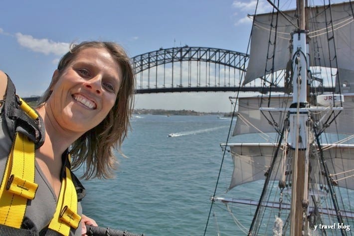 caz at the top of the mast on a tall ships Sydney Harbour