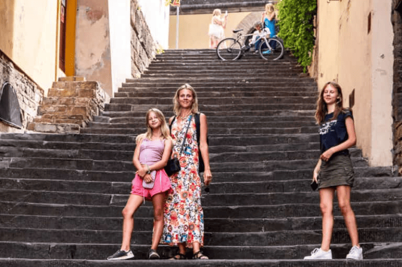 caz and girls on stairs in oltrarno